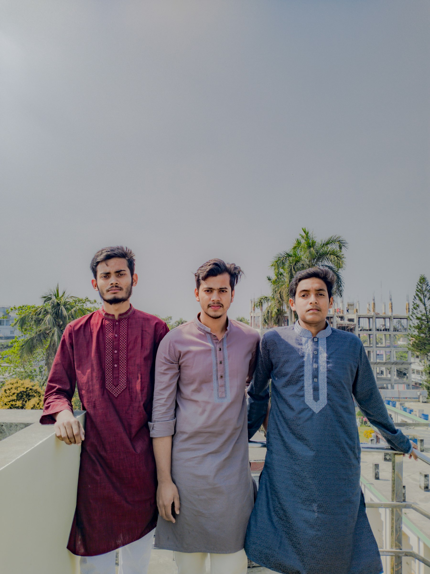 Three men in traditional attire